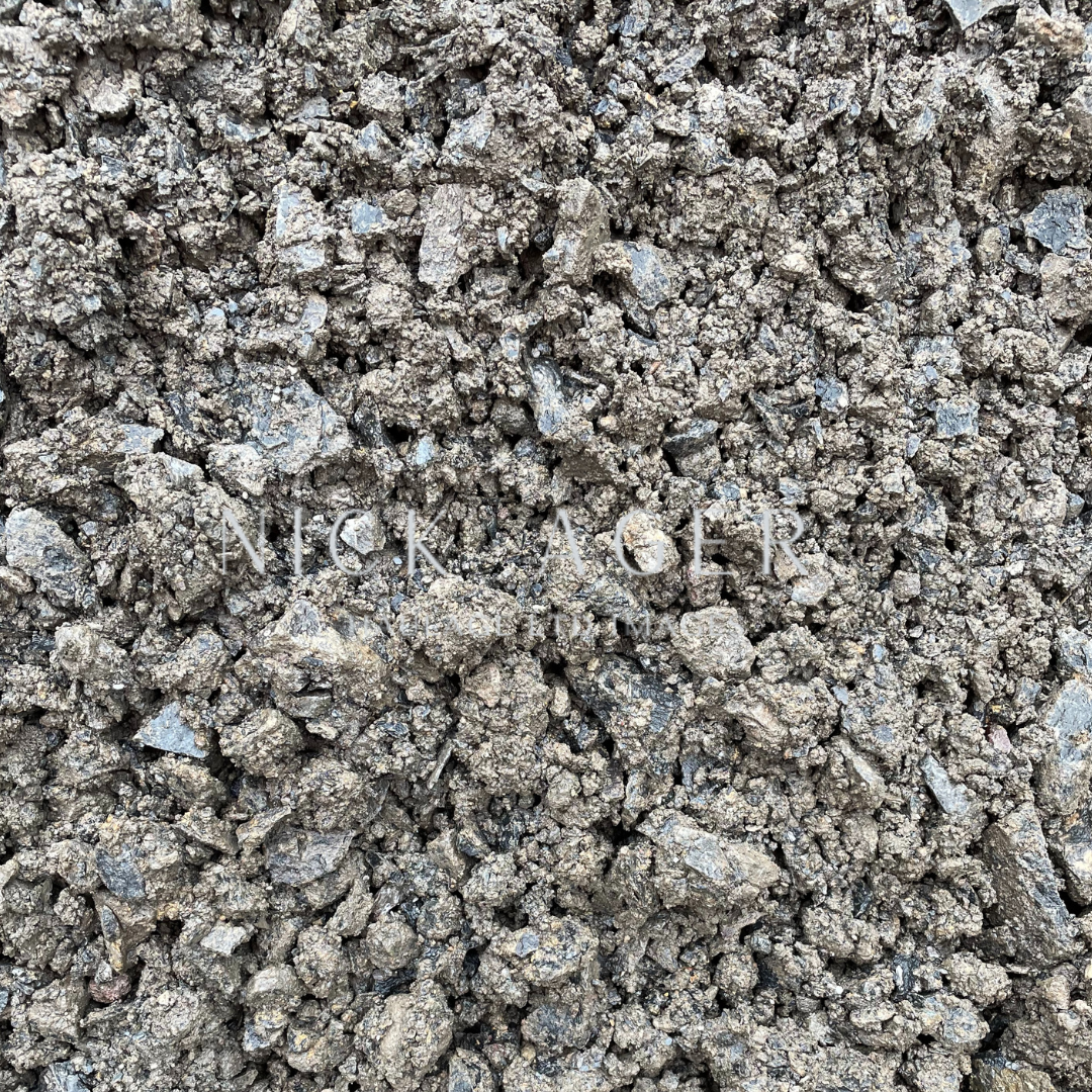 Close-up view of loose gravel showing various stone sizes and earthy colours.