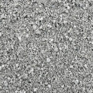 A close-up view of fine grey sand with various particle sizes, showcasing a uniform texture.