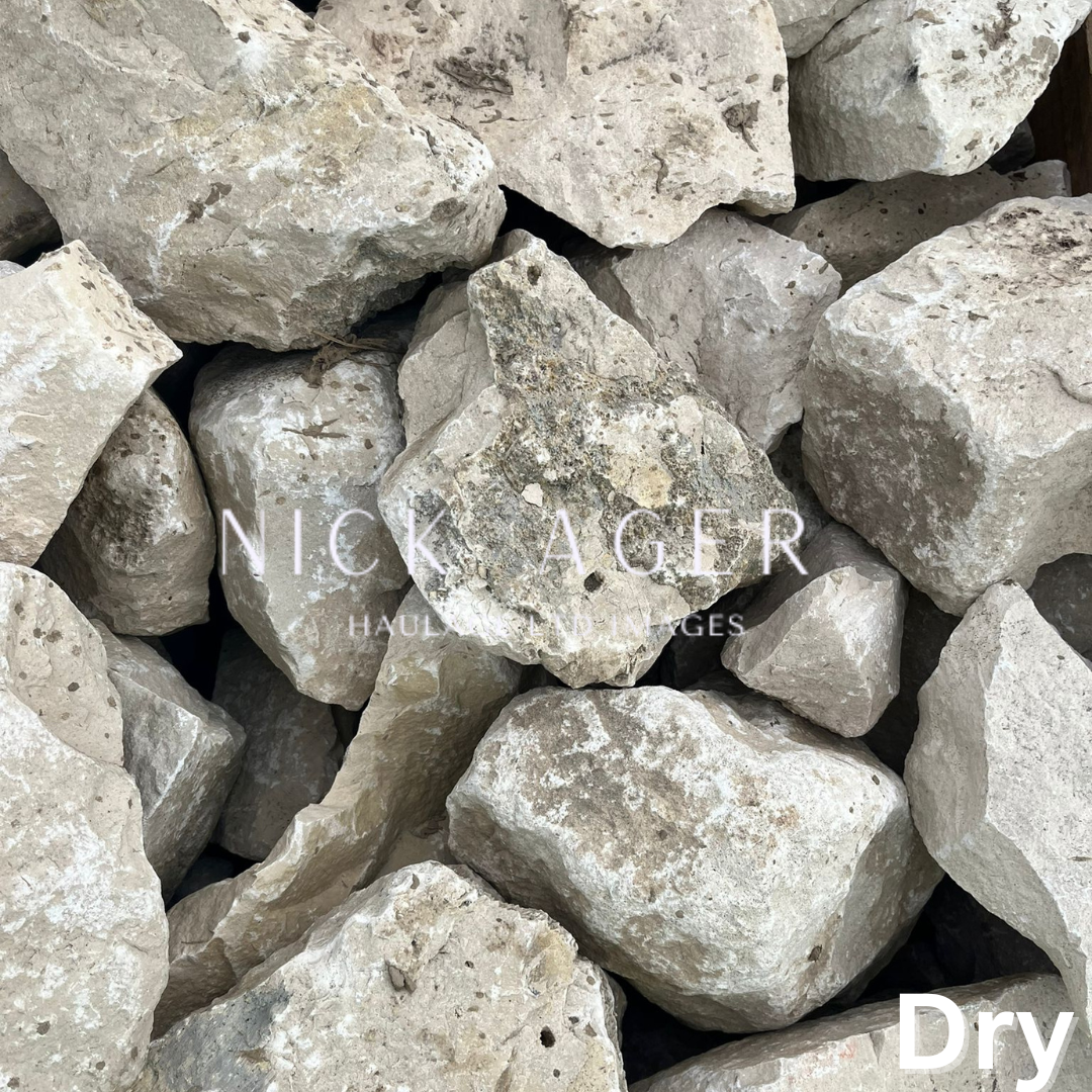 Close-up view of irregularly shaped dry natural stones and aggregates in a pile.