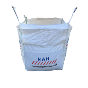 A large white bulk bag with a logo and text 'NAH' displayed prominently. The bag appears to be made from a durable material and is designed for transporting materials.
